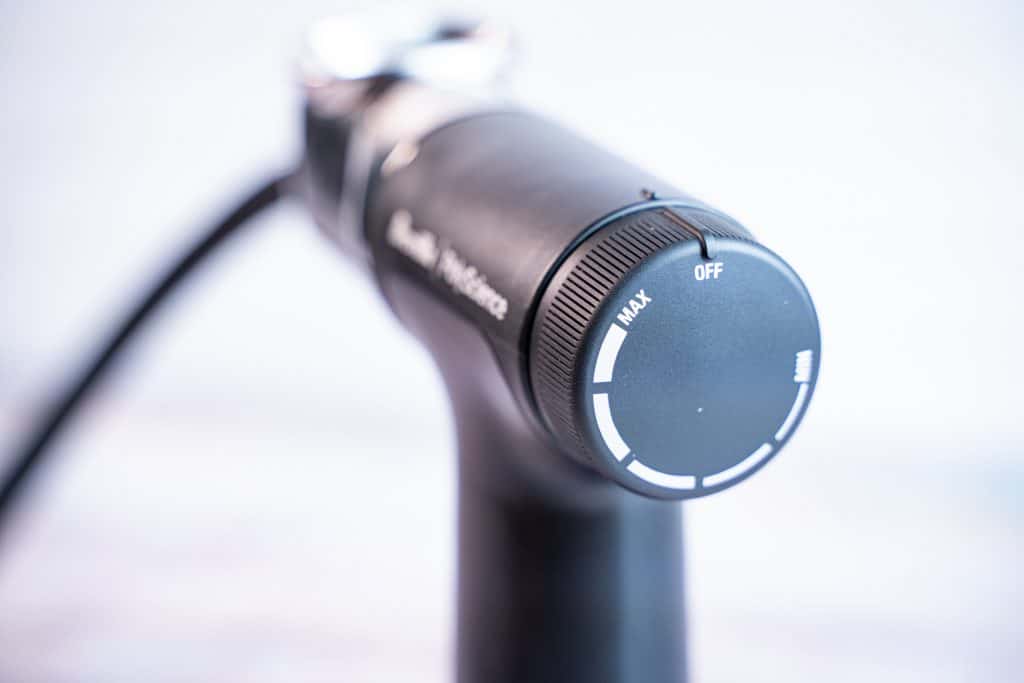 Close-up shot showing the knob on the back of the PolyScience smoking gun to control the intensity of the smoke.